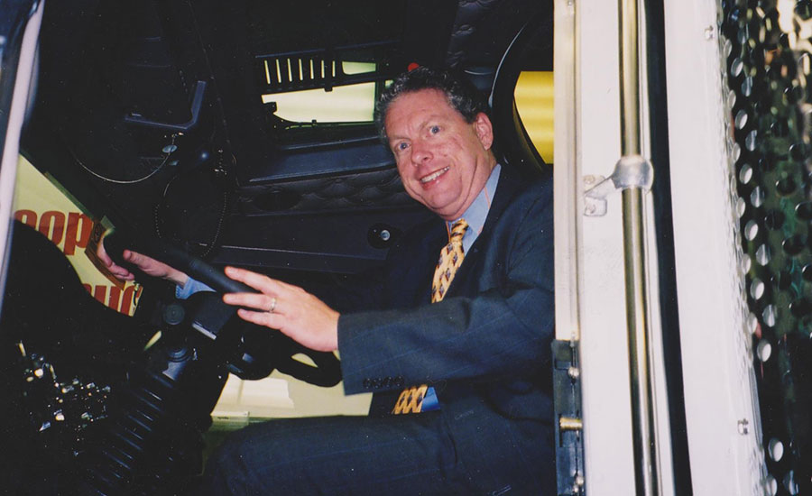 Austin Weber prepares to drive a new truck off the assembly line at Kenworth’s Renton, WA, plant